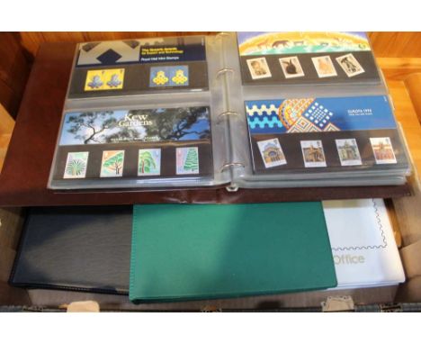 Four albums to include First Day Covers, black, green, white &amp; brown