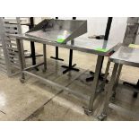 60IN X 30IN X 36IN STAINLESS STEEL TABLE ON CASTERS