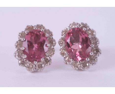 A pair of 18ct &amp; 9ct white gold cluster earrings set with oval cut pink tourmalines? approx. total weight 2.50 carats, su