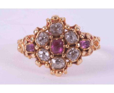 An antique yellow gold ring (no hallmarks) set with six old round cut diamonds, approx. 0.36 carats total weight and three sm