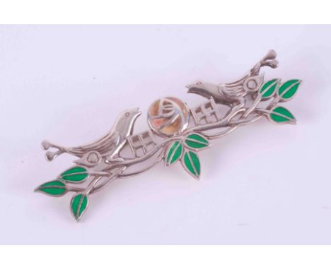 A silver &amp; enamel 'Rennie Macintosh'? bird, flower &amp; leaf brooch, 8.86g, length 6cm.