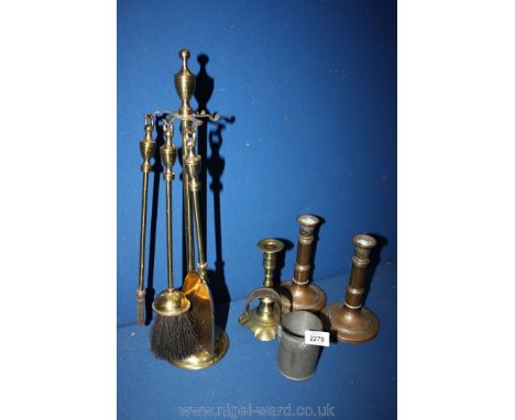 A quantity of brass including 18th c. candlestick and pair of telescopic candlesticks, fireside companion set, etc.