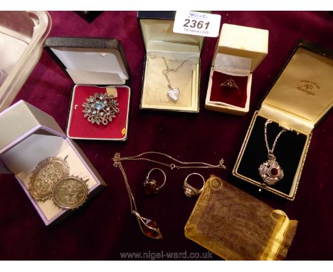 A quantity of jewellery including silver chain pendant with ruby stone, brooch and heart chain, ring etc