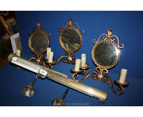 A quantity of brass light fittings including three mirrored wall sconces