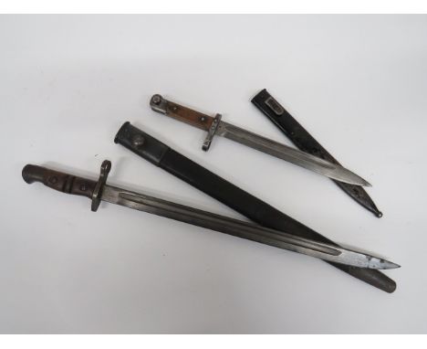 British P13 Sword Bayonet 17 1/4 inch, single edged blade with central fuller.  Forte with maker 'Remington' and British Ordn