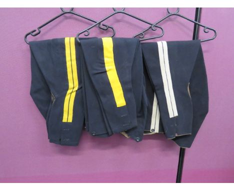 Three Pairs of Pre WW1 Cavalry Breeches consisting pair of dark blue breeches.  Double yellow braid side lines.  Inner calf l