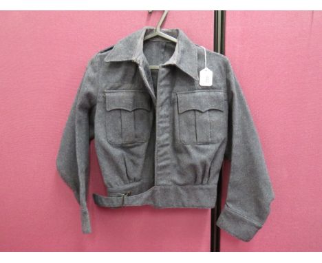 RAF 1942 Dated WAAF Battle Dress Blouse blue grey woollen, single breasted, open collar, short jacket.  Lower extended belt. 