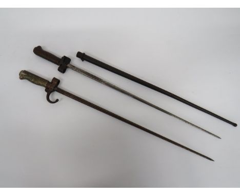 Two French M1886 Lebel Bayonets consisting M1886 1st pattern example.  Cruciform blade.  Steel hook quillon and muzzle ring. 