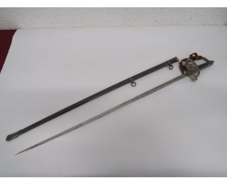 Scots Guards Officer's Named Levee Dress Sword 32 1/2 inch, narrow dumb bell blade with central fuller.  Etched Kings crown G