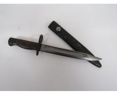 British No 5 MK1 Jungle Carbine Bayonet 8 inch, single edged, clipped point blade with large fuller.  Large muzzle ring.  Bla