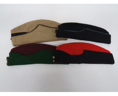 Three Coloured Field Service Caps consisting Royal Artillery example.  Red crown and body.  Dark blue curtain.  Front KC bras