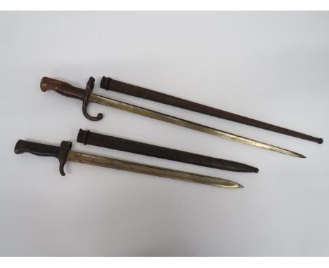 Two French Bayonets consisting M1874 Gras bayonet.  Single edged T section blade.  The back edge with maker dated '1876'.  St