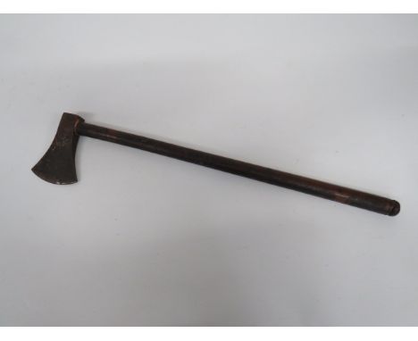 19th Century Indian Axe single edged, small head.  Wooden shaft with internal strengthening bar.  Brass rose head decoration 