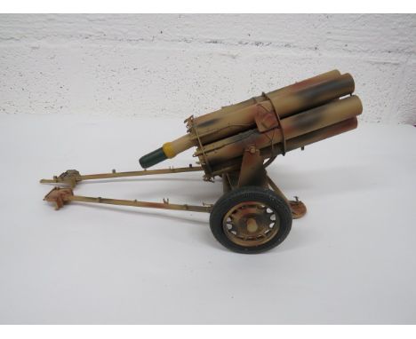 Modern Model of a German Nebelwerfers Rocket Launcher well made model.  6 tubular camouflaged barrels.  Lower bracket with op