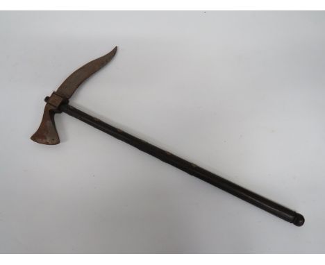 19th Century Double Bladed Indian Axe single edged, small head.  Rear fitted double edged Yataghan spike.  Wooden shaft with 