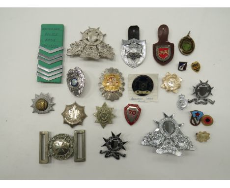 Selection of Foreign Police Badges including white metal Police helmet plate ... Chrome Malta Police helmet plate ... White m