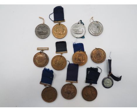Selection of Liverpool Education Committee Medals consisting 4 x gilt examples, all with various names and districts dated 19