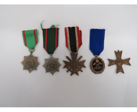 Small Selection of German Medals consisting gilt Eastern Front Merit decoration with swords ... Gilt Eastern Front Merit deco