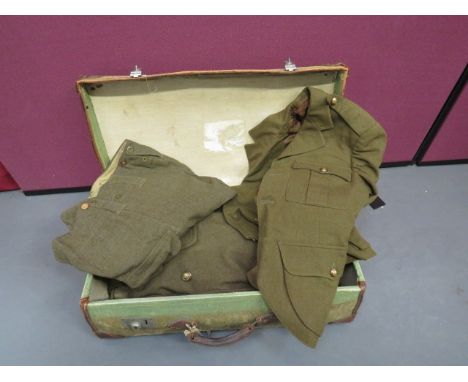 Gordon Highlanders Uniform Set consisting Officer's khaki service dress doublet.  Pleated chest pockets and lower bag pockets