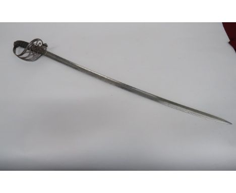 Victorian Rifle Volunteers Officer's Sword 32 1/2 inch, single edged, slightly curved blade.  Foliage scroll engraving with c