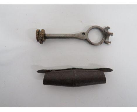Two Various Gun Tools consisting steel double ended shot measure.  Oval tubular form with hinged steel ends ... Unusual 16 bo
