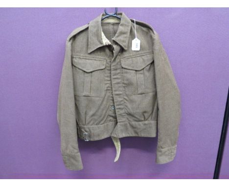 1937 Pattern Battle Dress Blouse khaki woollen, single breasted, closed collar, short jacket.  Pleated chest pockets with but