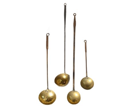 An iron handled ladle, 18th c, the brass bowl with pierced rim, 63cm l and three other contemporary or later examples (4)  