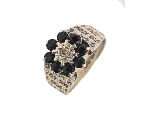 A sapphire and diamond ring in 9ct white gold, Birmingham 1977, 5.5g, size K  Wear consistent with age
