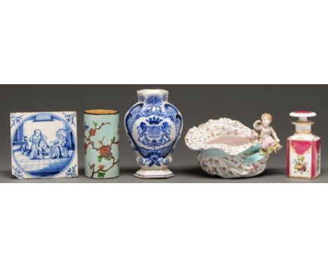 A Dutch Delftware biblical tile and vase, 18th c and later,&nbsp; vase 16.5cm h, a German porcelain bonnet shaped basket with
