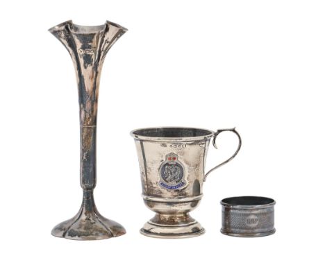 A George V silver christening mug, applied with a badge, 84mm h, by W I Broadway &amp; Co, Birmingham 1934, a silver vase and