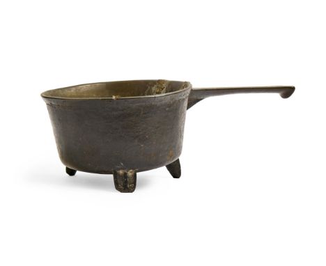 An English bronze skillet, probably West Country, 17th c,&nbsp;the handle cast 4H, 47cml  Handle raised back onto pan when de