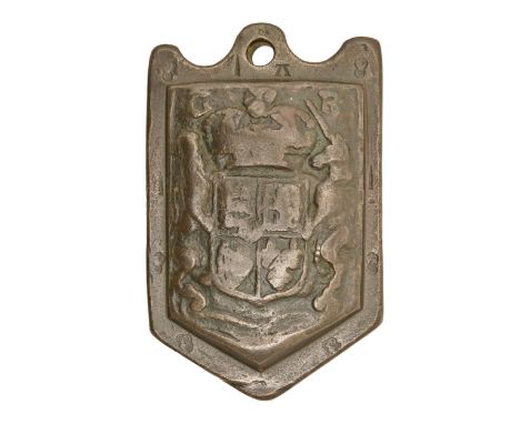 A George I bronze wool weight, 1714-1727, of 7lbs, 16.5cm, stamped dagger, A, crown over C and other marks  Good condition, c