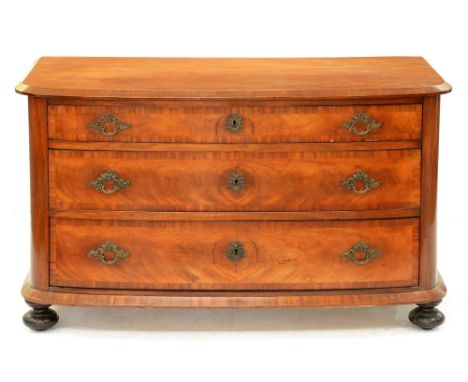 A Northern European bow fronted mahogany chest of drawers, late 19th c, on bun feet, 69cm h; 54 x 117cm  Good condition
