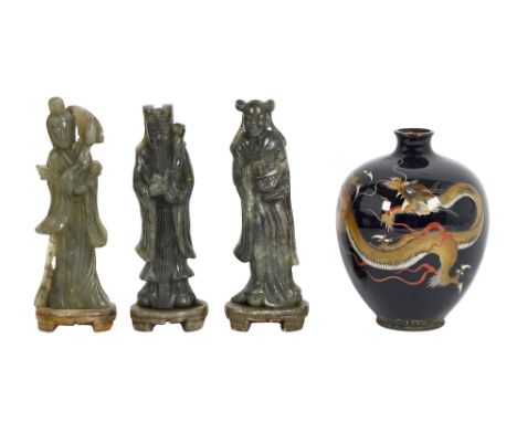 A Chinese cloisonne enamel oviform vase, decorated with a dragon, 13cm h, and a set of three Chinese hardstone carvings of im
