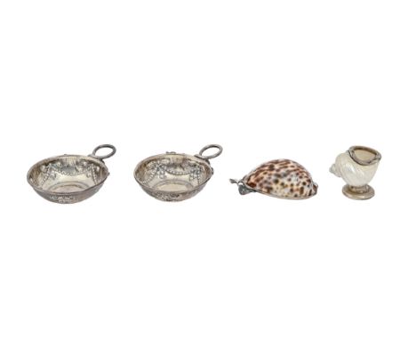 A Continental silver mounted cowrie shell spoon or ladle, 84mm l, marked 800, a silver mounted turbo shell and a pair of silv