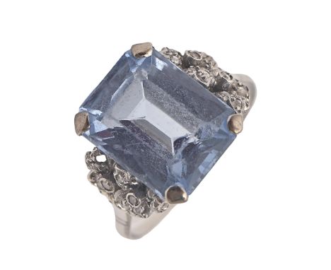 A blue zircon and diamond ring, in white gold, the step-cut zircon 11mm x 14mm, marked with an inventory number, 6g, size R  