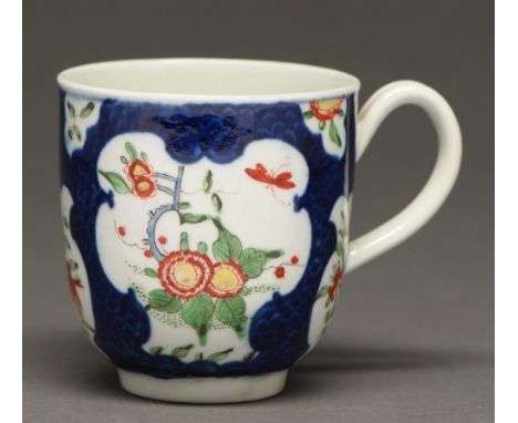 A Worcester scale blue ground kakiemon coffee cup, c1770,&nbsp; 6.5cm h, fretted square in underglaze blue  Descending hairli