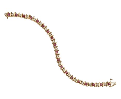 A ruby and diamond bracelet, in gold, 18cm long, marked 14K, 15.2g  Good condition