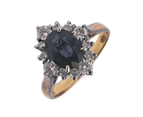 A sapphire and diamond ring in 18ct gold, London 1975, 4.6g, size L  Good condition