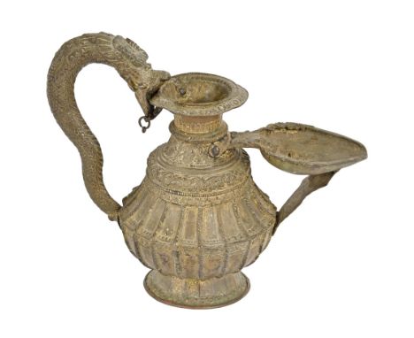 A Nepalese sukunda lamp,&nbsp;late 19th c,&nbsp;with dragon handle, 24cm x 29cm  Lamp is incomplete and with some splits to m