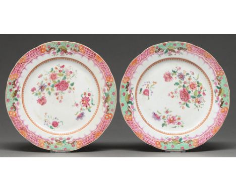 A pair of Chinese export famille rose plates, c.1770, enamelled with peonies, the border with alternating panels of puce scal