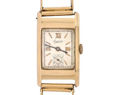 An Everite art deco 9ct gold rectangular wristwatch, 22 x 32mm, Birmingham 1935, on contemporary Continental gold ladder brac