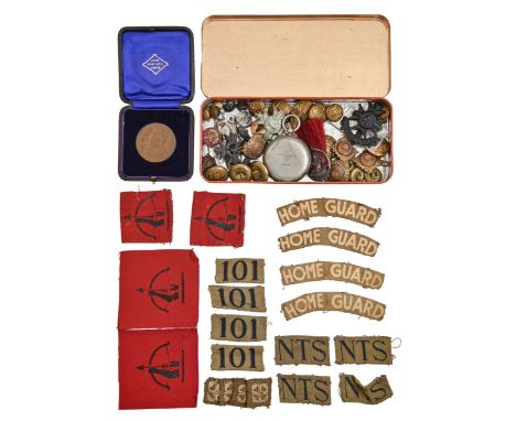 Miscellaneous military items, to include regimental brass tunic buttons, cloth insignia for the Home Guard and anti-aircraft 