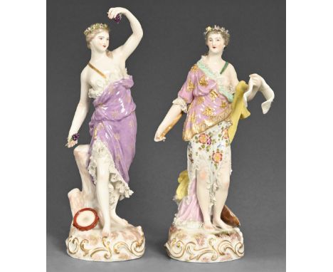 A pair of Dresden figures of muses, first half of 20th century, applied with lace and gilt decoration, 22.5cm h, blue undergl