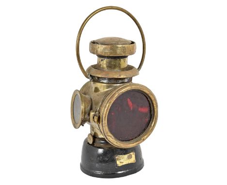 A Lucas "King of the Road" Edwardian brass motoring lamp, 32cm h including handle  Slightly dented and misshapen, numerous ol