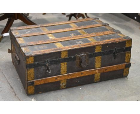 An early 20th c brass and iron mounted cabin trunk, 81cm w; 48cm x 31cm  