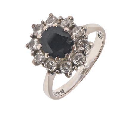 A sapphire and diamond ring,&nbsp; in 18ct white gold, London 1975, 6g, size J  Good condition