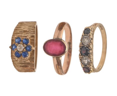 Three gold rings,&nbsp; variously gem set, 9.5g, size N, O, P  Single stone ring - stone scratched from wear, the others good