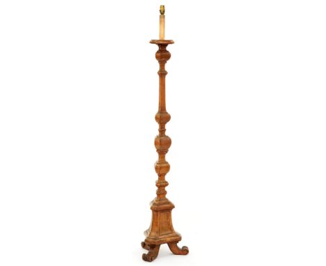 A carved and stained wood standard lamp in the form of a Baroque alter candlestick, 145cm h excluding fitment  Good condition