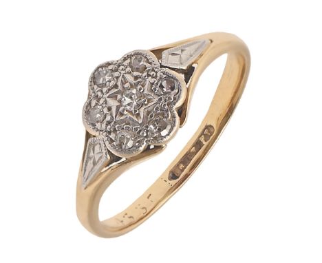 A diamond ring, illusion set, gold hoop marked 18ct PT, 2.6g, size F  Typical but generally light wear to setting